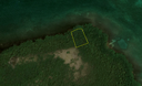 1.017 acres of land on Columbus Caye , approximately  13 miles East of Dangriga Town, Stann Creek District