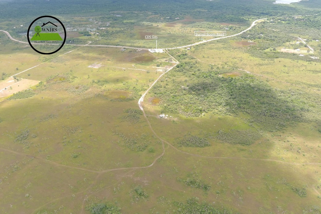 10.0 acres situate along the East side of the Belize  river, in the vicinity of Burrel Boom Village, Belize District