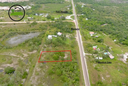 2,517.880 square meters of land being Entry No.1060n situated in the Biscayne Village, Belize District