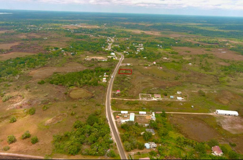 1480.213 square meters of land situate on the eastern side of the Phillip Goldson Highway near mile 18, Sand Hill Village Belize District